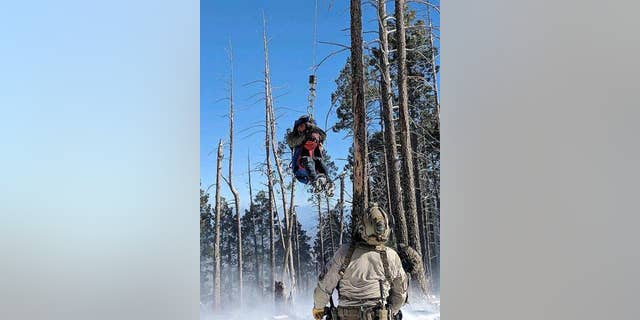 The men were airlifted to medical personnel on the ground, where they were transported to a nearby hospital.