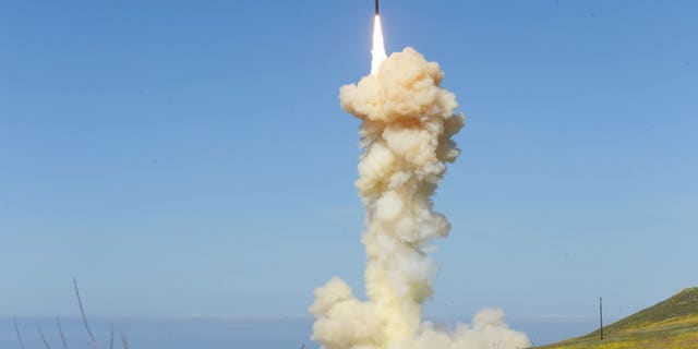 In this photo provided by the Missile Defense Agency, the lead ground-based Interceptor is launched from Vandenberg Air Force Base, Calif., in a "salvo" engagement test of an unarmed missile target Monday, March 25, 2019.