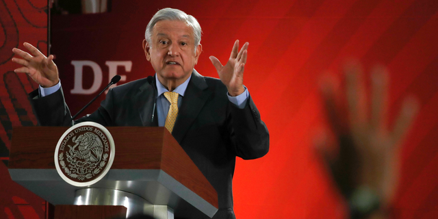 FILE - In this Friday, March 8, 2019 file photo, Mexican President Andres Manuel Lopez Obrador answers questions from journalists at his daily 7 a.m. press conference at the National Palace in Mexico City. Lopez Obrador said he sent a letter to Spain and the Vatican on March 1, asking them to apologize for the conquest of the Americas five centuries ago. (AP Photo/Marco Ugarte, File)