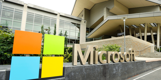 This July 3, 2014 file photo shows Microsoft Corp. signage outside the Microsoft Visitor Center in Redmond, Wash.