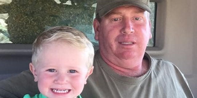 James Wilke and his grandson Brecken. Wilkes died attempting to rescue a stranger from the floods in Nebraska.
