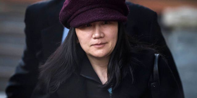 Huawei chief financial officer Meng Wanzhou leaves her home to attend a court appearance in Vancouver, British Columbia.