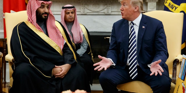 Then-President Trump meets with Saudi Crown Prince Mohammed bin Salman in the Oval Office of the White House in Washington, March 20, 2018. (Associated Press)