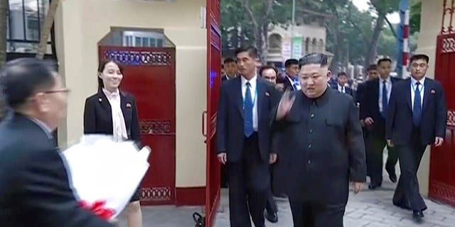 In this image made from video released on Wednesday, March 6, 2019, by North Korean broadcaster KRT, North Korean leader Kim Jong Un waves as he visits the North Korean Embassy in Hanoi, Vietnam.