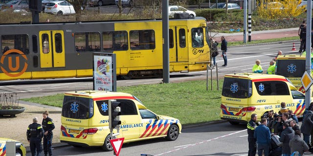 Ambulances are seen next to a tram after a shooting in Utrecht, Netherlands, Monday.
