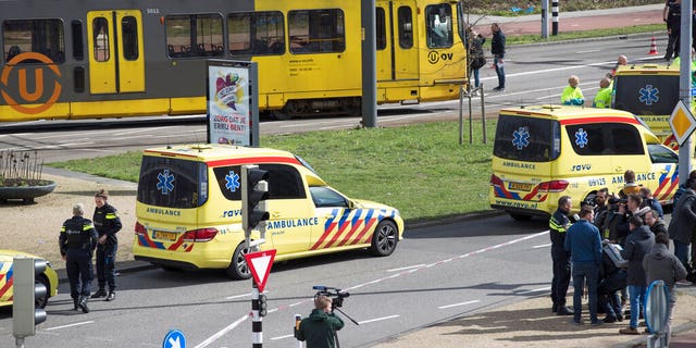 Ambulances are seen next to a tram after a shooting in Utrecht, Netherlands, Monday.