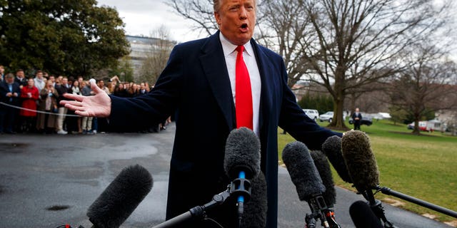 President Donald Trump talks with reporters before boarding Marine One on the South Lawn of the White House, Friday, March 22, 2019, in Washington. Special counsel Robert Mueller on Friday turned over his long-awaited final report on the contentious Russia investigation, ending a probe that has cast a dark shadow over Donald Trump's presidency with no new charges but launching a fresh wave of political battles over the still-confidential findings. 