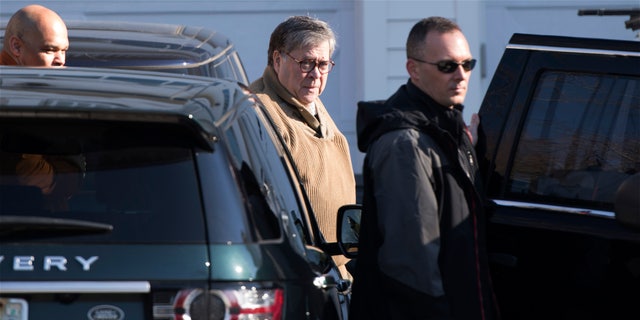 Attorney General William Barr leaves his home in McLean, Va., on Saturday morning, March 23, 2019. Special counsel Robert Mueller closed his long and contentious Russia investigation with no new charges, ending the probe that has cast a dark shadow over Donald Trump's presidency. (AP Photo/Sait Serkan Gurbuz)