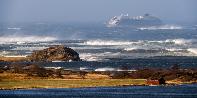 Photos from the scene showed the large vessel surrounded by choppy, white-capped waves.