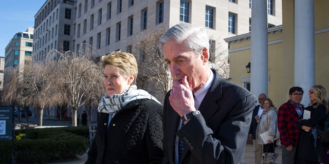 Special Counsel Robert Mueller, and his wife, Ann, leaving St. John's Episcopal Church, across from the White House, in Washington on Sunday. (AP Photo/Cliff Owen)