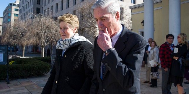 Special Counsel Robert Mueller, and his wife, Ann, leaving St. John's Episcopal Church, across from the White House, in Washington on Sunday. (AP Photo/Cliff Owen)