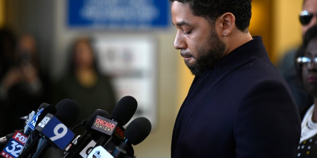 Actor Jussie Smollett talks to the media before leaving Cook County Court after his charges were dropped Tuesday, March 26, 2019, in Chicago.