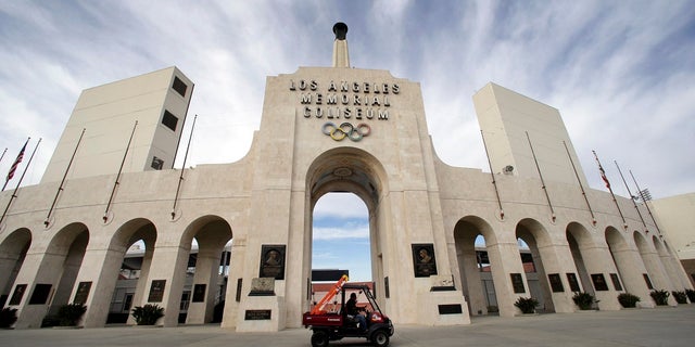 The University of Southern California's sale of naming rights for Los Angeles Memorial Coliseum is being criticized as dishonoring the historic stadium's dedication as a memorial to soldiers who fought and died in World War I. (Associated Press)