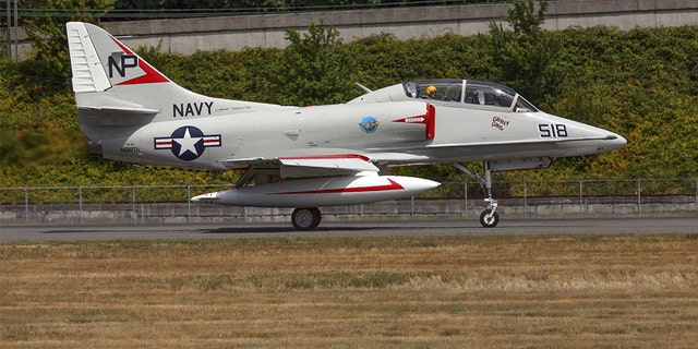 Seattle, Wa, United States - July 17, 2016: The TA-4J, a 2-seater version of the A4 Skyhawk light navy jet fighter was seen flying over Seattle for Boeing's centennial celebrations.