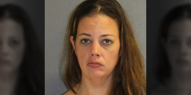 Apryl Connolly, 36, was charged with an additional count of tampering with physical evidence after police said she threw a pill into a nearby trash can.
