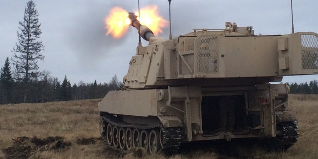 Artillerymen of 1st Battalion, 41st Field Artillery Regiment fire M109 Alpha 6 Paladins, on Tapa Army Base, Estonia, Nov. 27, 2015.