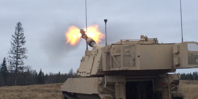 Artillerymen of 1st Battalion, 41st Field Artillery Regiment fire M109 Alpha 6 Paladins, on Tapa Army Base, Estonia, Nov. 27, 2015.