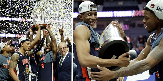 Auburn Tigers celebrate after defeating the Tennessee Volunteers in the championship game of the NCAA Southeastern Conference basketball tournament Sunday, March 17, 2019, in Nashville, Tenn. Auburn won 84-64.