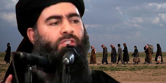 FILE - In this Friday, Feb. 22, 2019 file photo, men walk to be screened after being evacuated out of the last territory held by Islamic State group militants, near Baghouz, eastern Syria, Friday, Feb. 22, 2019. Even as they face imminent defeat, militants of the IS have remained organized and ruthless to their last breath, keeping their institutions functioning as best they can (AP Photo/Felipe Dana, File )