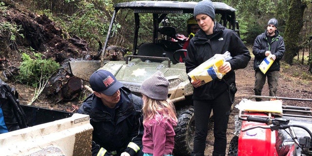 Caroline Carrico is assessed by search crews after being lost in the Northern California wilderness for 44 hours.