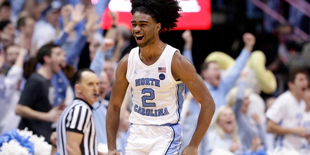 North Carolina's Coby White (2) reacts following a play against Duke during the second half of an NCAA college basketball game in Chapel Hill, N.C., Saturday, March 9, 2019. North Carolina won 79-70.