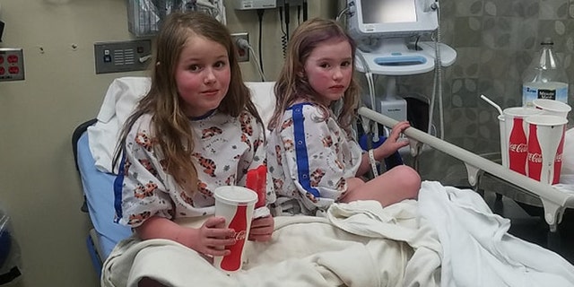 Leia and Caroline Carrico can be seen eating pizza in the hospital after being rescued after spending 44 hours lost in the Northern California wilderness.