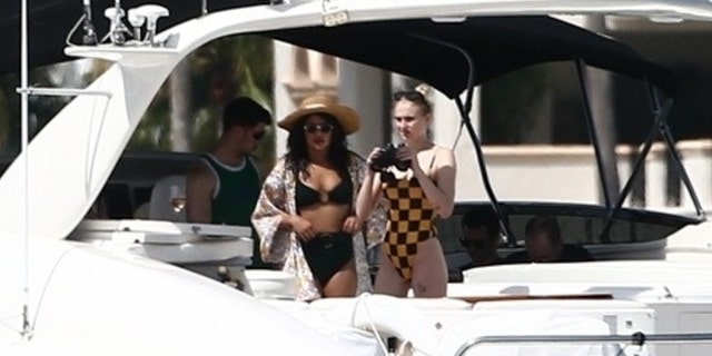 Priyanka Chopra and Sophie Turner leave by boat with their husband and fiancé, Nick and Joe Jonas. The group looked casual as it was preparing for its fun day on the water. Kevin Jonas is joined to them with other family members and friends.