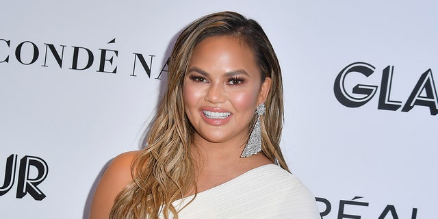 Chrissy Teigen said that she `` is okay with not being able to wear again. ''
