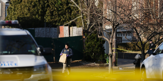 Police are working near the place where an alleged head of the Gambino crime family was shot dead in the Staten Island area of ​​New York on Thursday, March 14, 2019. Francesco 