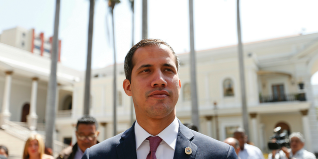 Venezuelan opposition leader Juan Guaido, who has declared himself interim president, arrives to the National Assembly for a meeting with "Frente Amplio," a coalition of opposition parties, and other civic groups in Caracas, Venezuela, Monday, March 18, 2019.