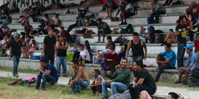 Central American migrants, part of the caravan hoping to reach the U.S. border, take a break in Acacoyagua, Chiapas State, Mexico, Thursday, March 28, 2019. A caravan of about 2,500 Central Americans and Cubans is currently making its way through Mexico's southern state of Chiapas. (AP Photo/Isabel Mateos)