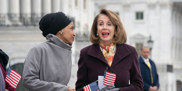 Speaker Nancy Pelosi defended Democrat Rep. Ilhan Omar and said she doesn't think the congresswoman is anti-Semitic at an Economic Club event Friday. Omar and Pelosi are pictured outside the Capitol. (AP Photo/J. Scott Applewhite)