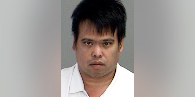 FILE - This file photo provided by the Brazos County Sheriff's Office in Bryan, Texas, shows Kyle Sandler after his arrest on June 21, 2018. Sandler, who pleaded guilty to scamming an Alabama town for nearly $2 million is due in federal court to find out how long he will go to prison. A judge scheduled sentencing for 43-year-old Sandler for Tuesday, March 26, 2019, in Montgomery, Ala. (Brazos County Sheriff's Office via AP, File)