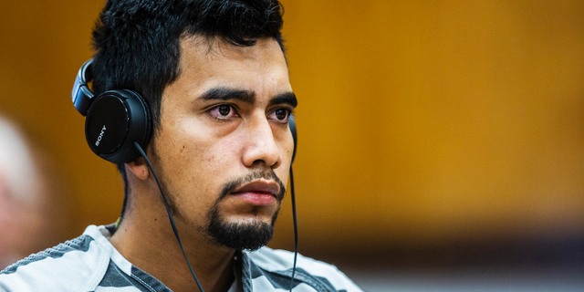 Cristhian Bahena Rivera wears headphones during his arraignment, Sept. 19, 2018. (Associated Press)