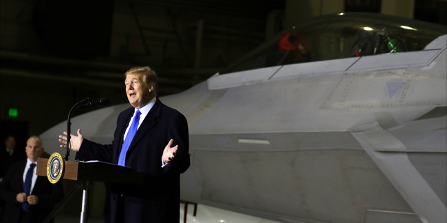 President Donald Trump speaks to service members at Joint Base Elmendorf-Richardson, Thursday, Feb. 28, 2019, in Anchorage, Alaska., during a refueling stop as he returns from Hanoi. (AP Photo/Evan Vucci)