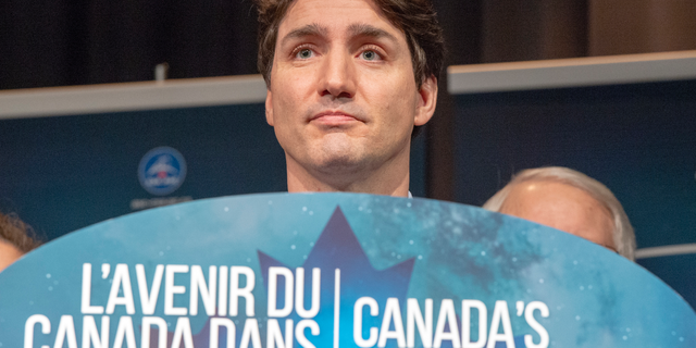 Canada's Prime Minister Justin Trudeau announces during a news conference, Thursday, Feb. 28, 2019, at the Canadian Space Agency headquarters in St. Hubert, Quebec, that Canada will take part in an international lunar space station project. (Ryan Remiorz/The Canadian Press via AP)