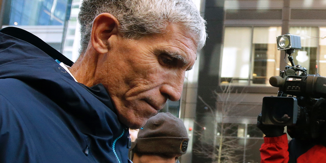 William "Rick" Singer founder of the Edge College & Career Network, departs federal court in Boston on Tuesday after he pleaded guilty to charges in a nationwide college admissions bribery scandal. (AP)