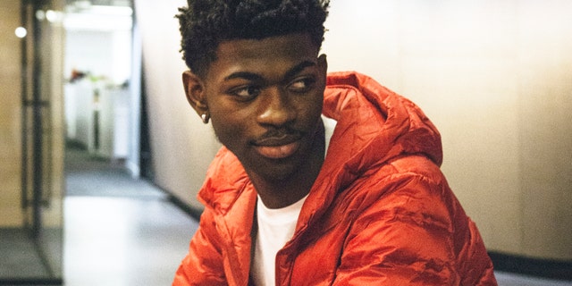 This undated image provided by Columbia Records shows rapper Lil Nas X, whose viral hit “Old Town Road” was removed from Billboard's country charts because they said it wasn’t country enough. (Associated Press)
