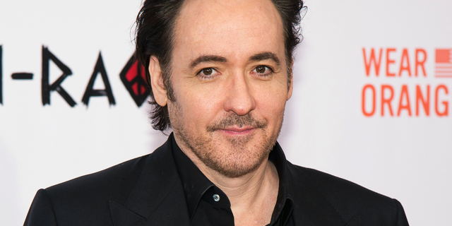 Actor John Cusack called on Bernie Sanders to reopen his campaign for fear that Donald Trump will suspend the general election.