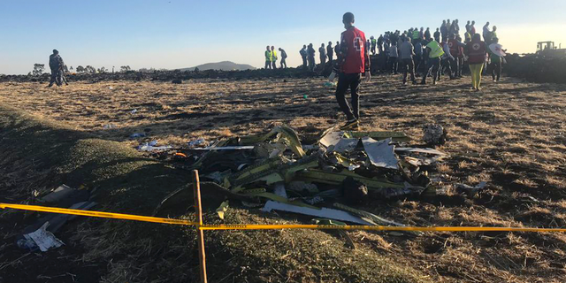 The Ethiopian Airlines flight crashed shortly after takeoff from Ethiopia's capital on Sunday morning, killing all 157 on board, authorities said, as grieving families rushed to airports in Addis Ababa and the destination, Nairobi. (AP Photo/Yidnek Kirubel)