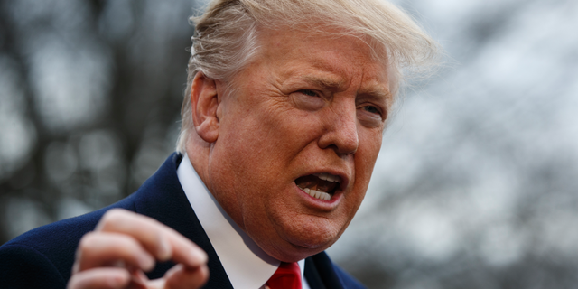 President Donald Trump talks with reporters before boarding Marine One on the South Lawn of the White House, Friday, March 22, 2019, in Washington. (AP Photo/Evan Vucci)