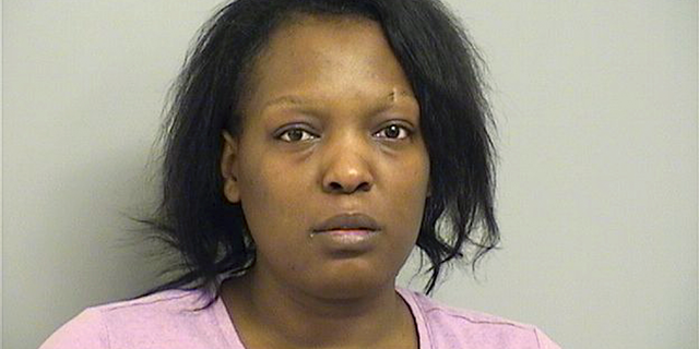 In this Tuesday, March 26, 2019, booking provided by the Tulsa County Sheriff's Department, shows 25-year-old Deionna Young who is being held without bond Tuesday on a first-degree murder charge in Tulsa. Police say Young, an Oklahoma restaurant manager, has been charged with killing an abusive customer, Desean Tallent, after reporting he threatened her, left and then returned. Police say Tallent later returned, but drove off. Young followed and allegedly shot him, then returned to work. (Tulsa County Sheriff's Department via AP)