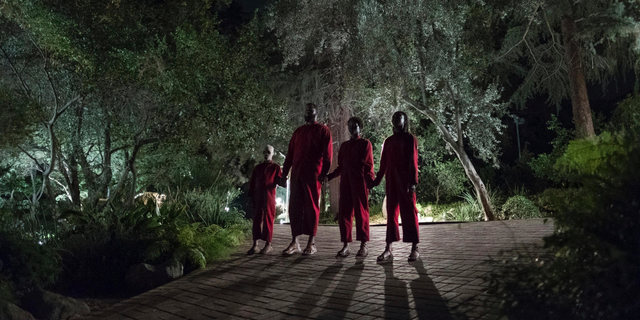 This image released by Universal Pictures shows Evan Alex, from left, Winston Duke, Shahadi Wright Joseph and Lupita Nyong'o in a scene from "Us," written, produced and directed by Jordan Peele.