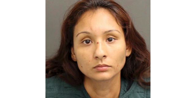 This Sunday, March 10, 2019, booking photo provided by the Orange County, Fla., Sheriff's Office show Rose Alcides Rivera. Rivera, accused of stabbing her daughter to death, told investigators she killed the 11-year-old to keep her from having sex, authorities in Florida said.