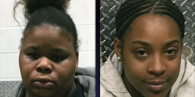 This photo provided by the North County Police Cooperative shows, Wilma Brown, left, and Ariana Silver who are both charged with abuse of a child stemming from incidents at Brighter Daycare in February 2019. The two Missouri day care center workers face felony charges after surveillance video showing a 3-year-old girl being thrown against a cabinet went viral. St. Louis County prosecutors filed child abuse charges Thursday, Feb. 28, 2019, against the woman who allegedly threw the child into the cabinet, 27-year-old Brown. The incident occurred Feb. 1 at Brighter Day Care and Preschool. (North County Police Cooperative/St. Louis Post-Dispatch via AP)