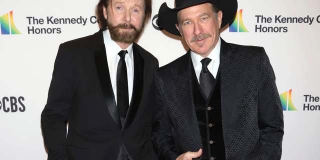 Ronnie Dunn, left, and Kix Brooks attend the 41st Annual Kennedy Center Honors in Washington. (Photo by Greg Allen/Invision/AP, File)