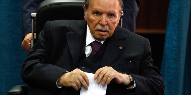FILE - In this May 4, 2017 file photo, Algerian President Abdelaziz Bouteflika prepares to vote in Algiers. (AP Photo/Sidali Djarboub, File)