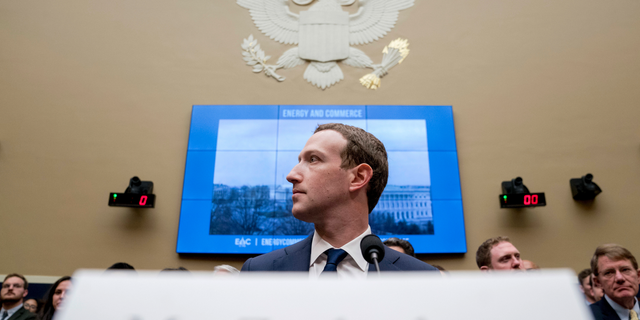 Facebook CEO Mark Zuckerberg arrives to testify before a House Energy and Commerce hearing on Capitol Hill in Washington. (AP Photo/Andrew Harnik, File)