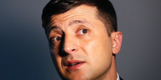 FILE In this file photo taken on Wednesday, Feb. 6, 2019, Ukrainian comedian and presidential candidate Volodymyr Zelenskiy speaks during his interview with The Associated Press, in Kiev, Ukraine. A comedian who is leading Ukraine's presidential election race has urged his supporters to propose candidates for top government jobs. Volodymyr Zelenskiy, who plays the nation's president in a popular TV series, called on his backers to suggest candidates for prime minister, foreign and defense ministers and other top officials. (AP Photo/Efrem Lukatsky, FIle)