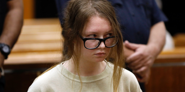 FILE - In this Oct. 30, 2018 file photo, Anna Sorokin appears in New York State Supreme Court on grand larceny charges. On Wednesday, March 27, 2019, Sorokin, the one-time darling of the Big Apple social scene is scheduled to stand trial on grand larceny and theft of services charges alleging she swindled $275,000 in a 10-month odyssey that saw her jetting to Omaha and Marrakesh. (AP Photo/Richard Drew, File)